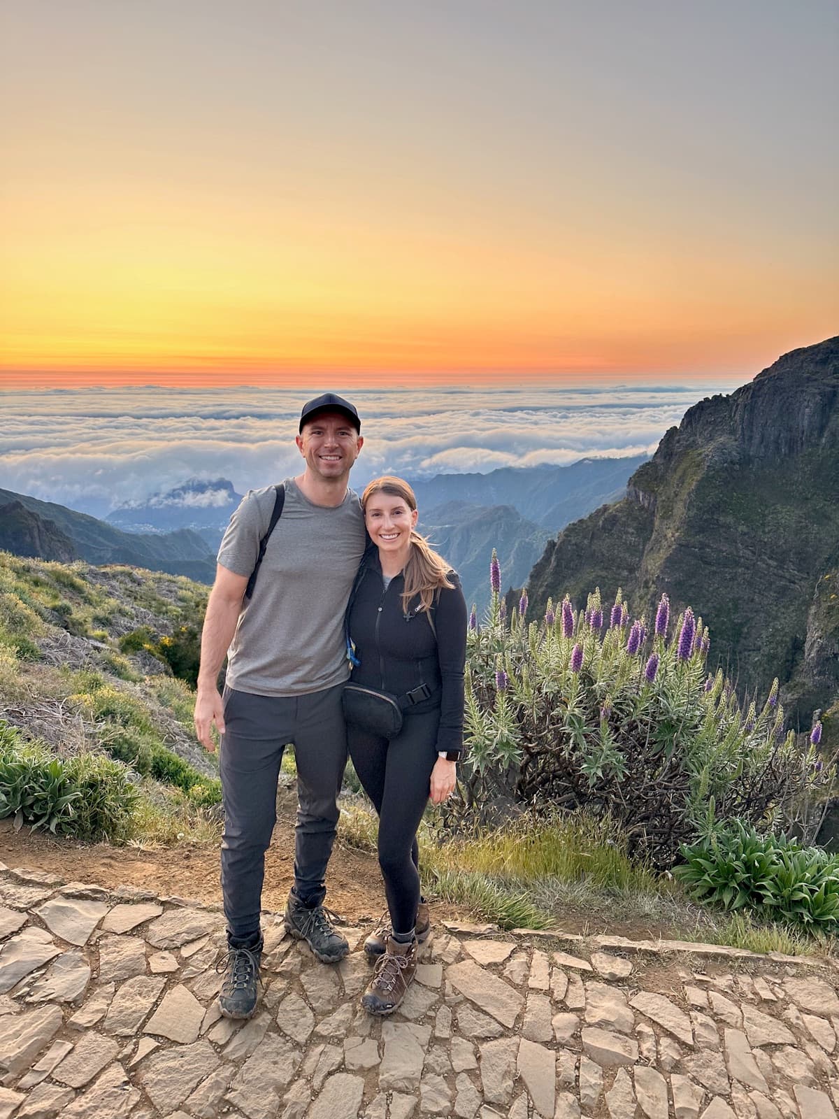Brett and Erin above a sea of clouds at sunrise in Madeira